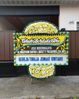 Papan Bunga Duka di Telaga Langsat